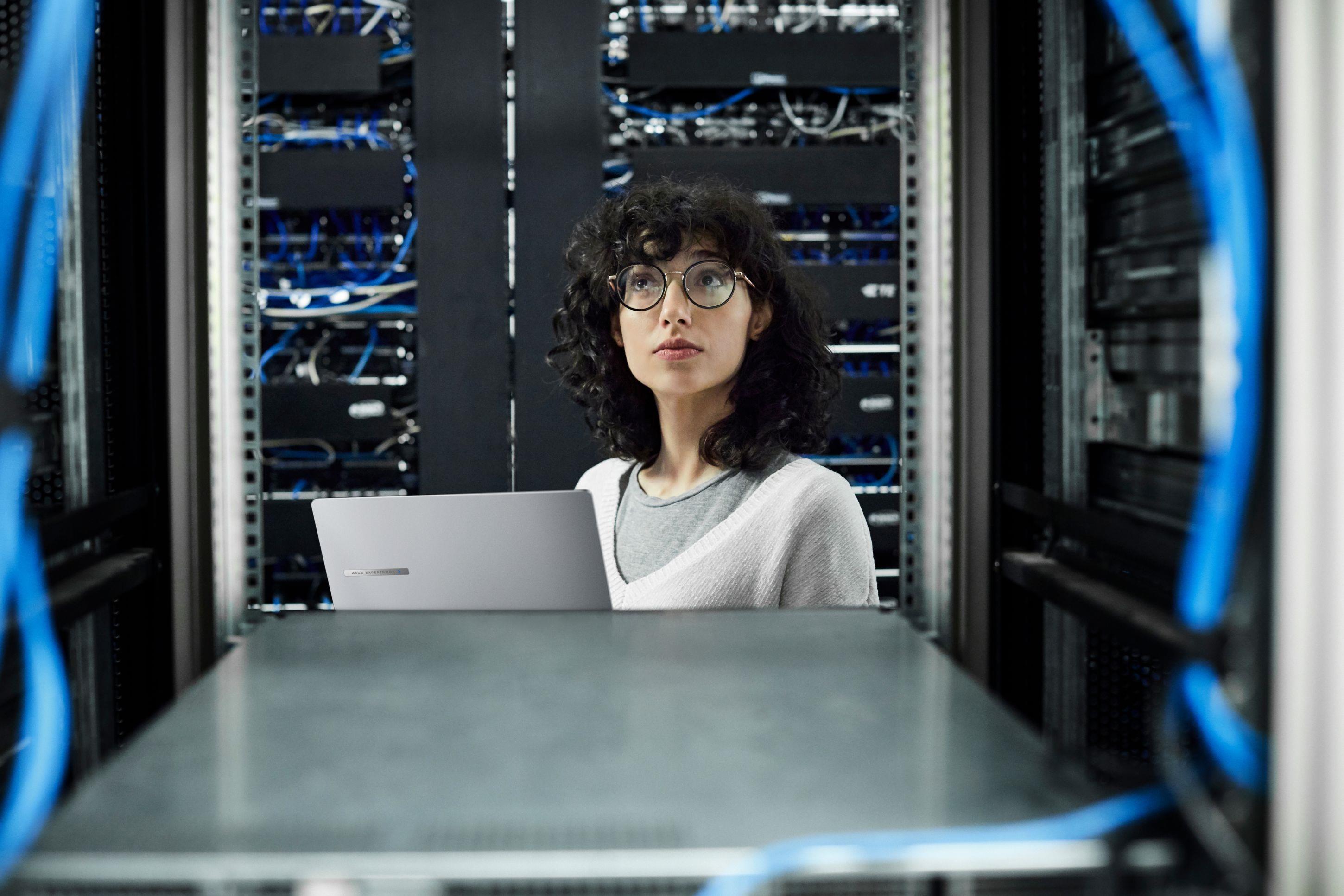 A woman with an ASUS laptop